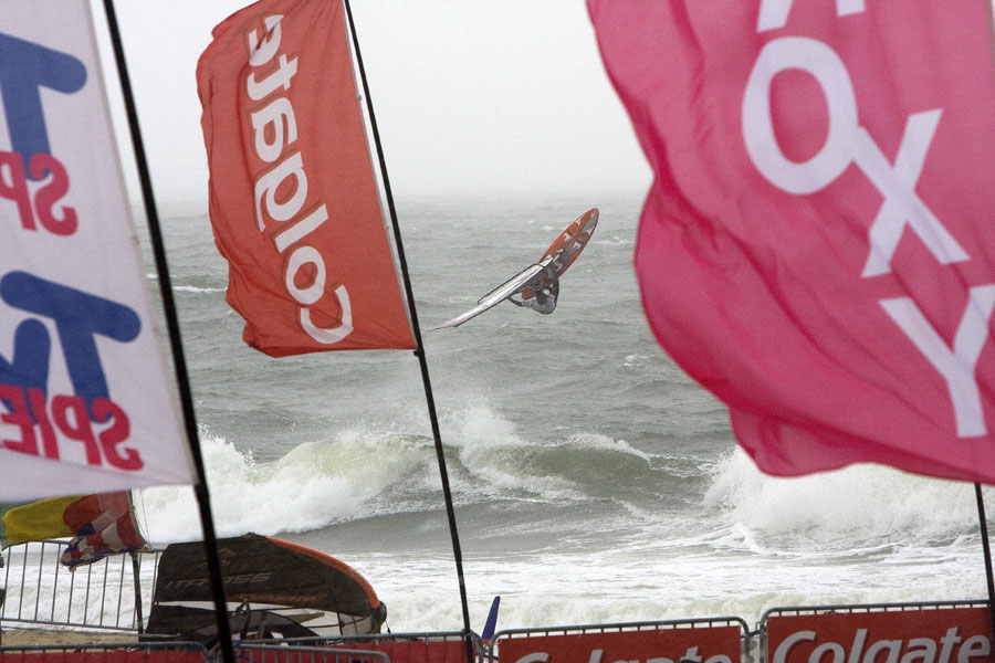 S08 wv Josh Angulo throws a back loop during a rain squall Josh Angulo throws a back loop during a rain squall