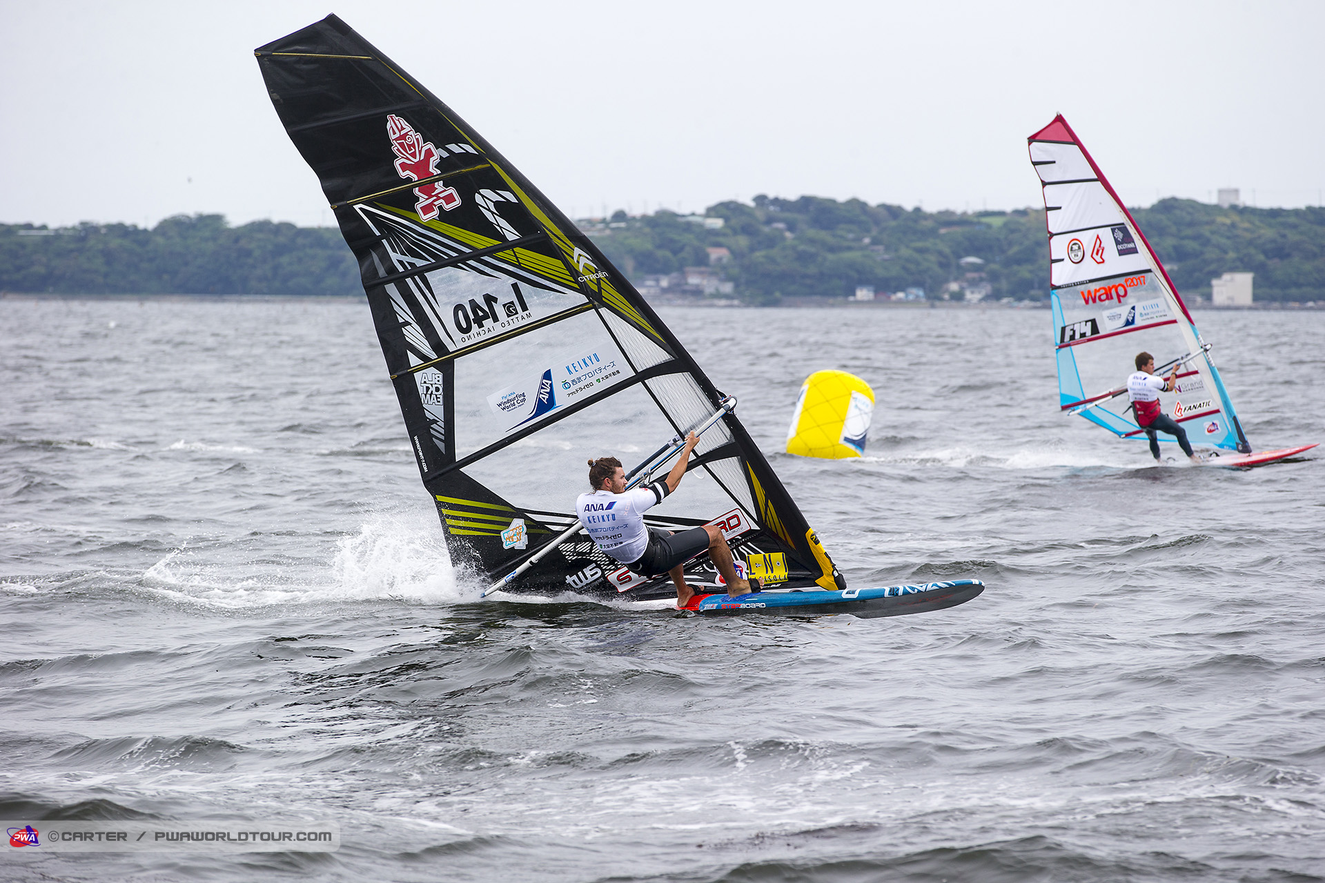 Iachino crosses the line