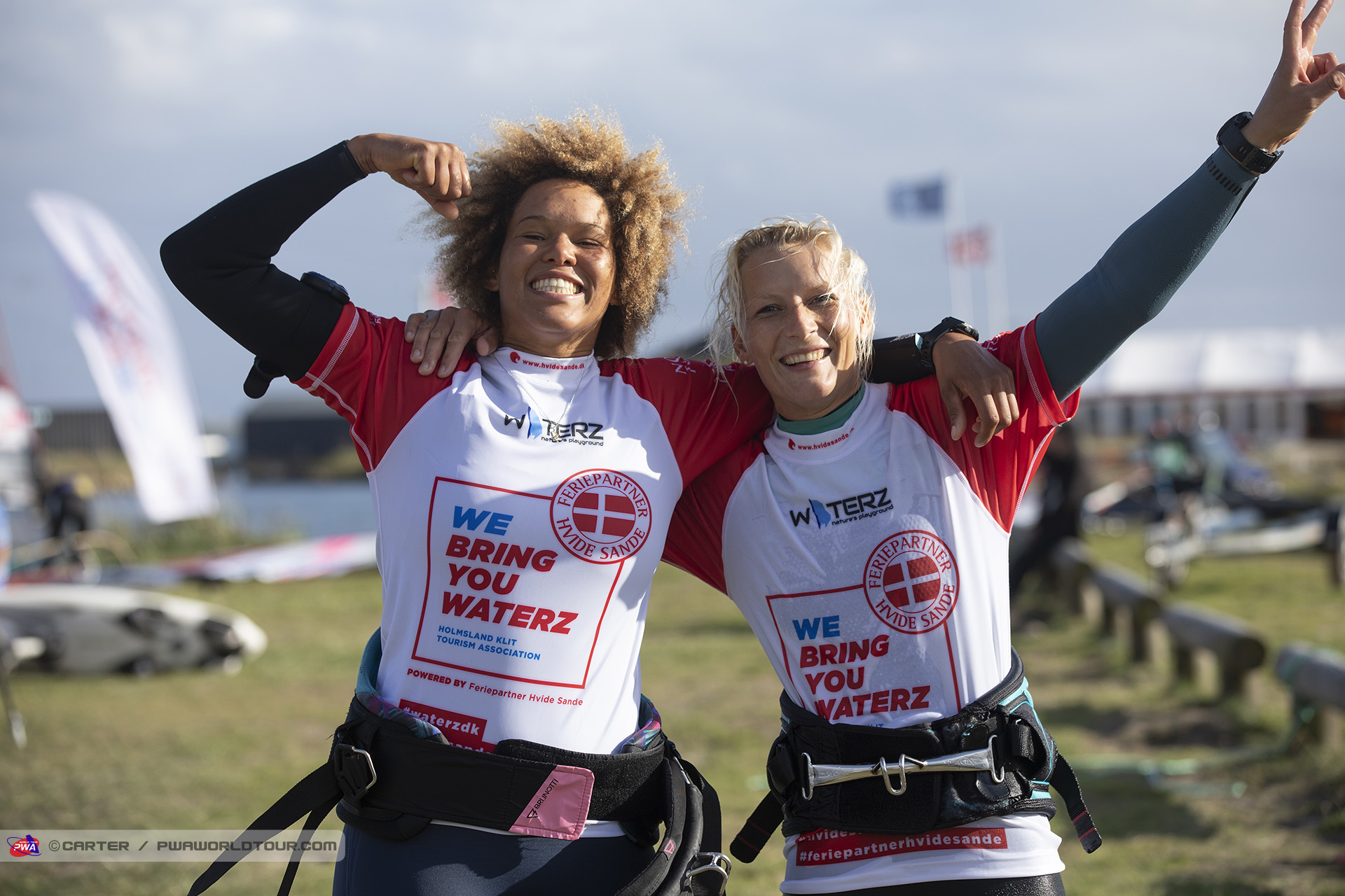 Sarah and Oda celebrate Race 7